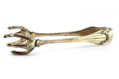 Silver ice tongs in the shape of revealed claws