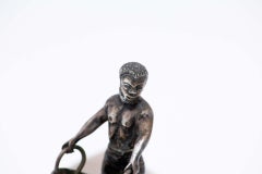 Silver indigenous figure toothpick holder on raised base