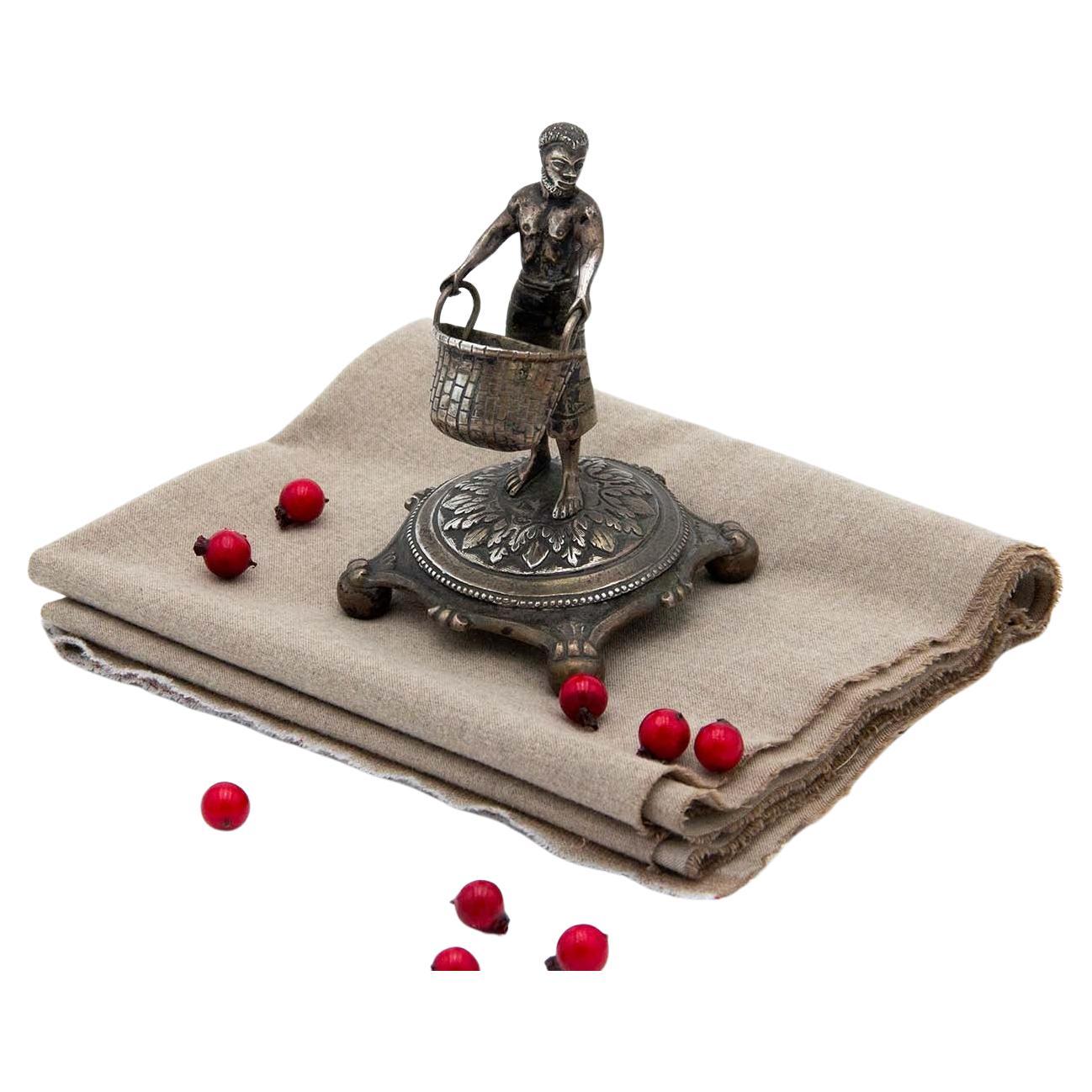 Silver indigenous figure toothpick holder on raised base