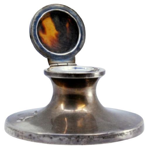 Silver inkwell w/ wooden base 
smooth body w/ tortoiseshell elements on the lid For Sale