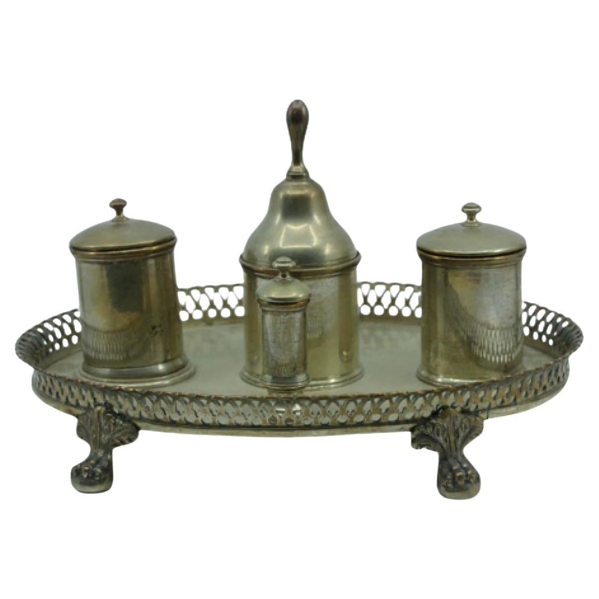Silver inkwell with grid, two reservoirs, pen holders 
claw feet For Sale
