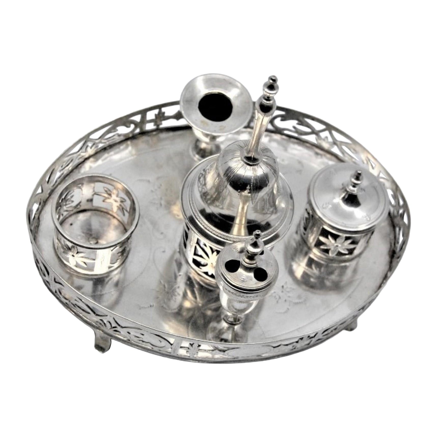 Silver inkwell with grid, two reservoirs, two pen holders and bell