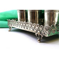 Silver inkwell with tanks, bell, square base & four openwork feet