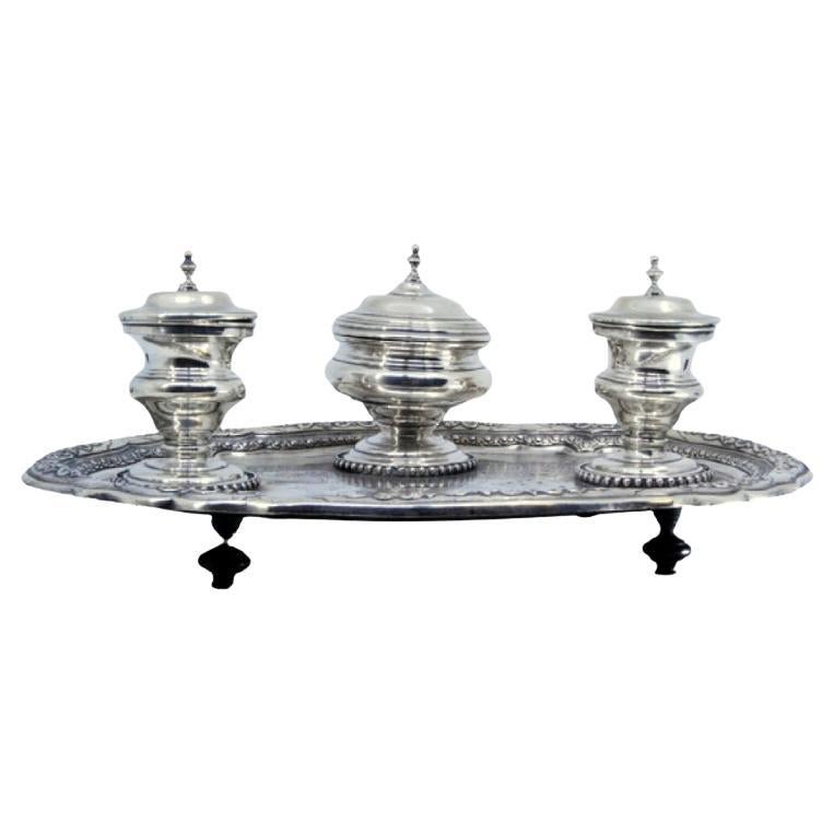 Silver inkwell with three engraved tanks, bell 
tray on claw feet