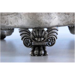 Silver inkwell with three reservoirs, bell & shell-based claw feet