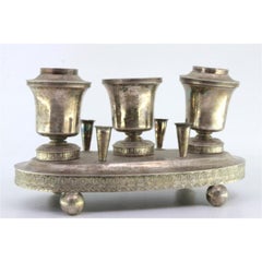 Silver inkwell with three reservoirs, guilloche pen holders & ball feet