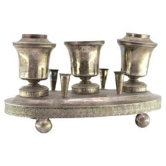 Silver inkwell with three reservoirs, guilloche pen holders 
ball feet
