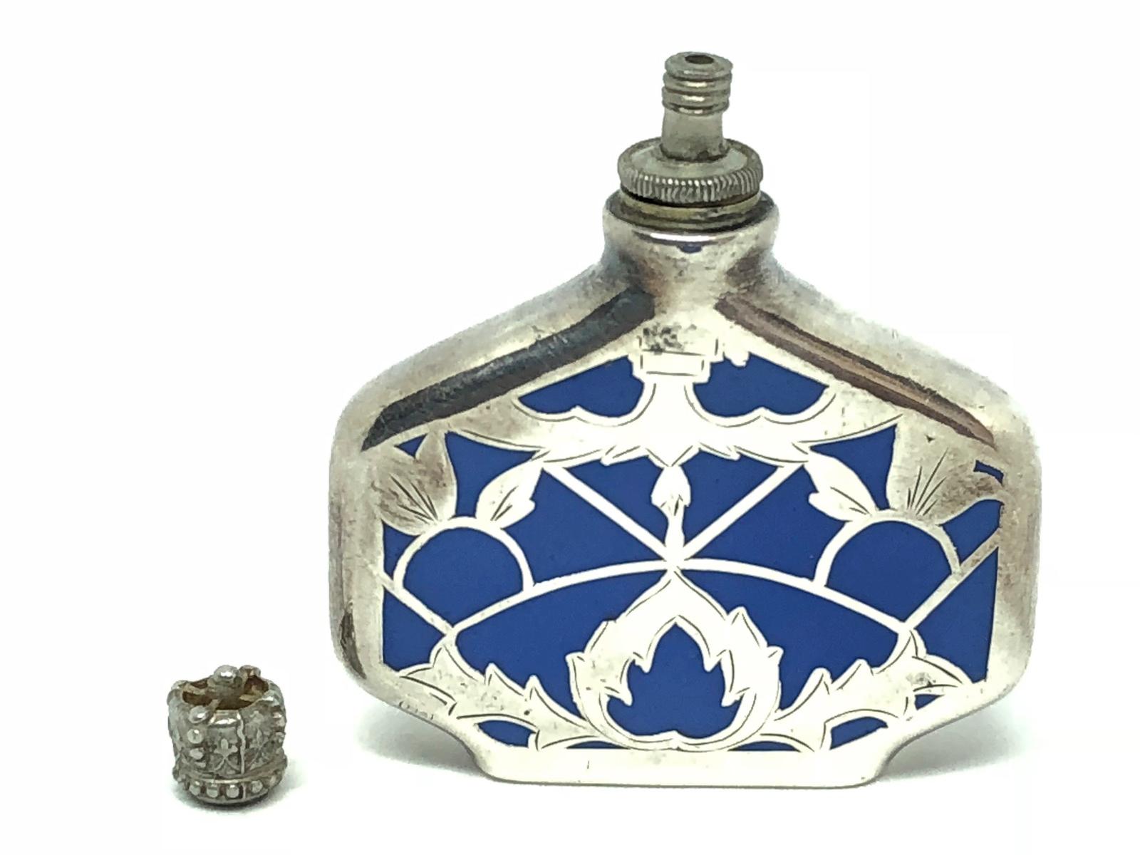 light blue perfume bottle