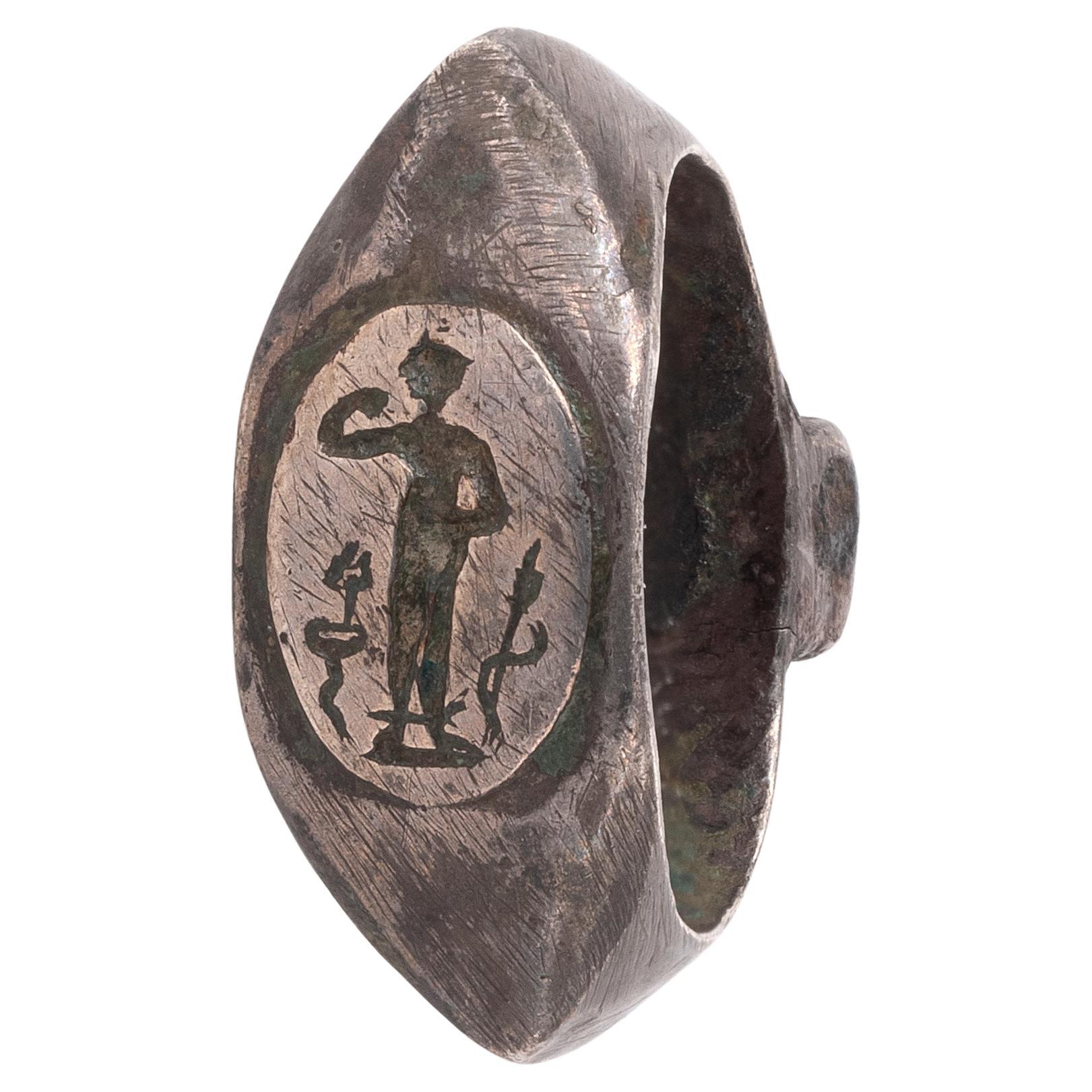 Anillo calcográfico de plata con divinidad romana s. I-III d.C.