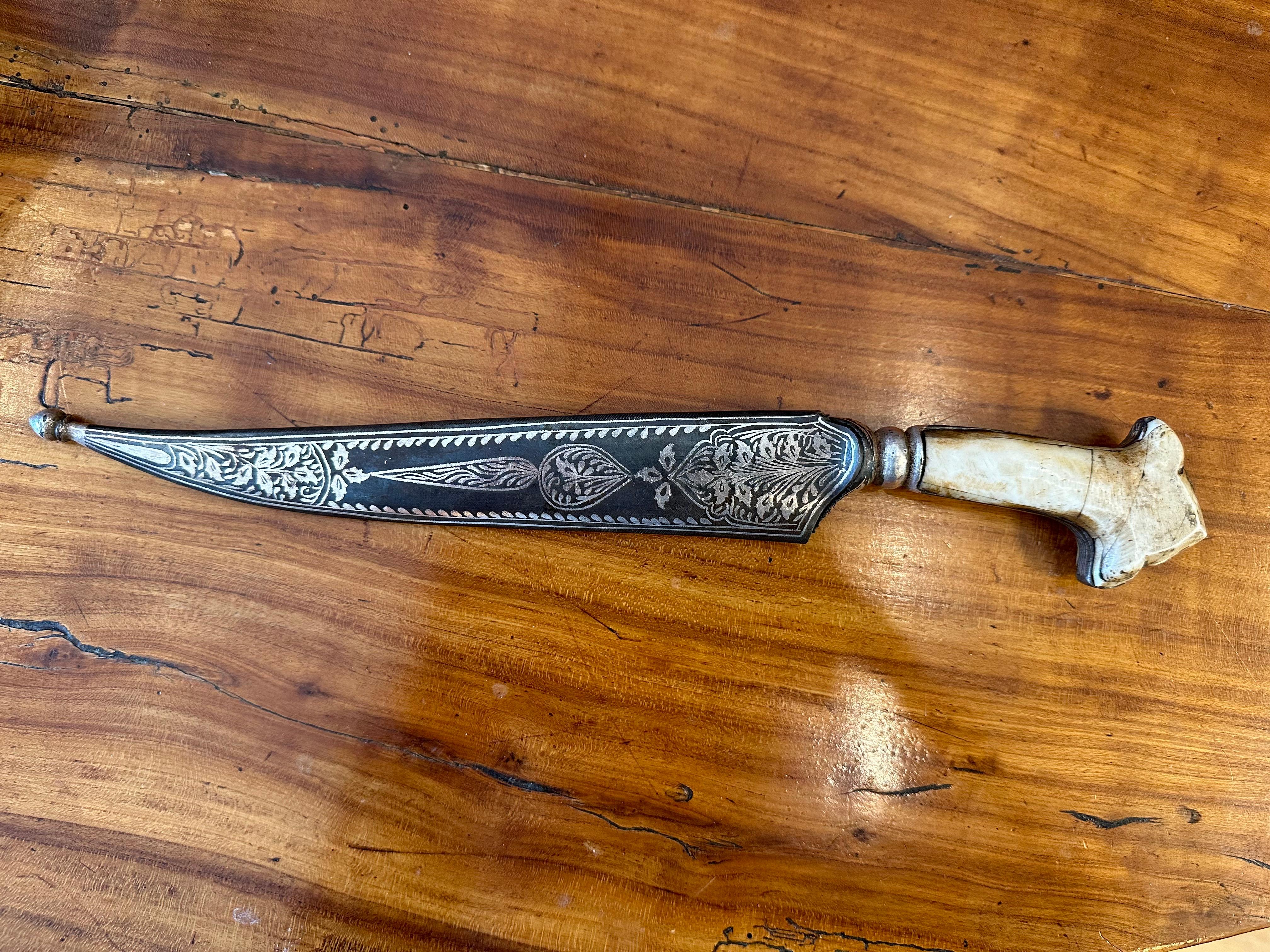 Silver “Jambiya” or Curved Dagger With Its Sheath. These are often Extremely well Crafted with Extraordinary inlaid Silver Designs accentuated with “Neillo”. They Often have Ivory Handles and were worn to Emphasize a Man’s Status. Ottoman Empire