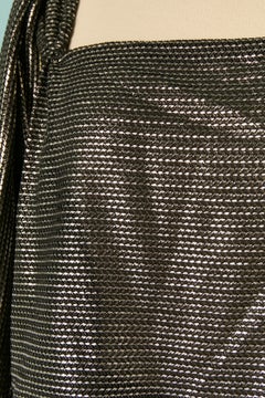 Silver jersey lamé top, skirt and jacket ensemble Circa 1970's