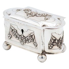 Silver jewelry box in the shape of a trunk
