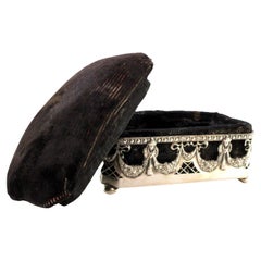Silver jewelry box with bows, garlands, velvet interior, on spherical feet