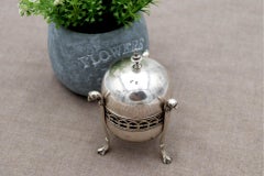 Silver jewelry box with cut-out grid