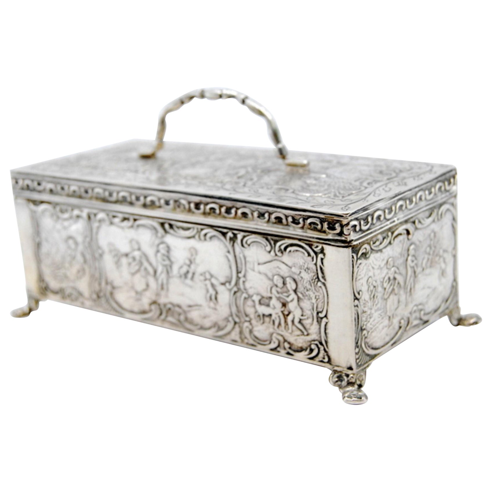 Silver jewelry box with engraving revealed in an idyllic moment