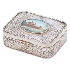 Silver jewelry box with engravings, surrounding frieze, center with Taj Mahal