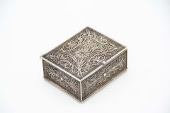 Silver jewelry box with filigree mesh