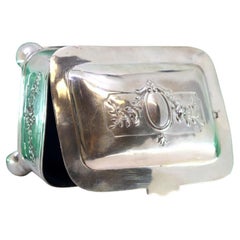 Silver jewelry box with monogram plaque, lined interior and ball feet