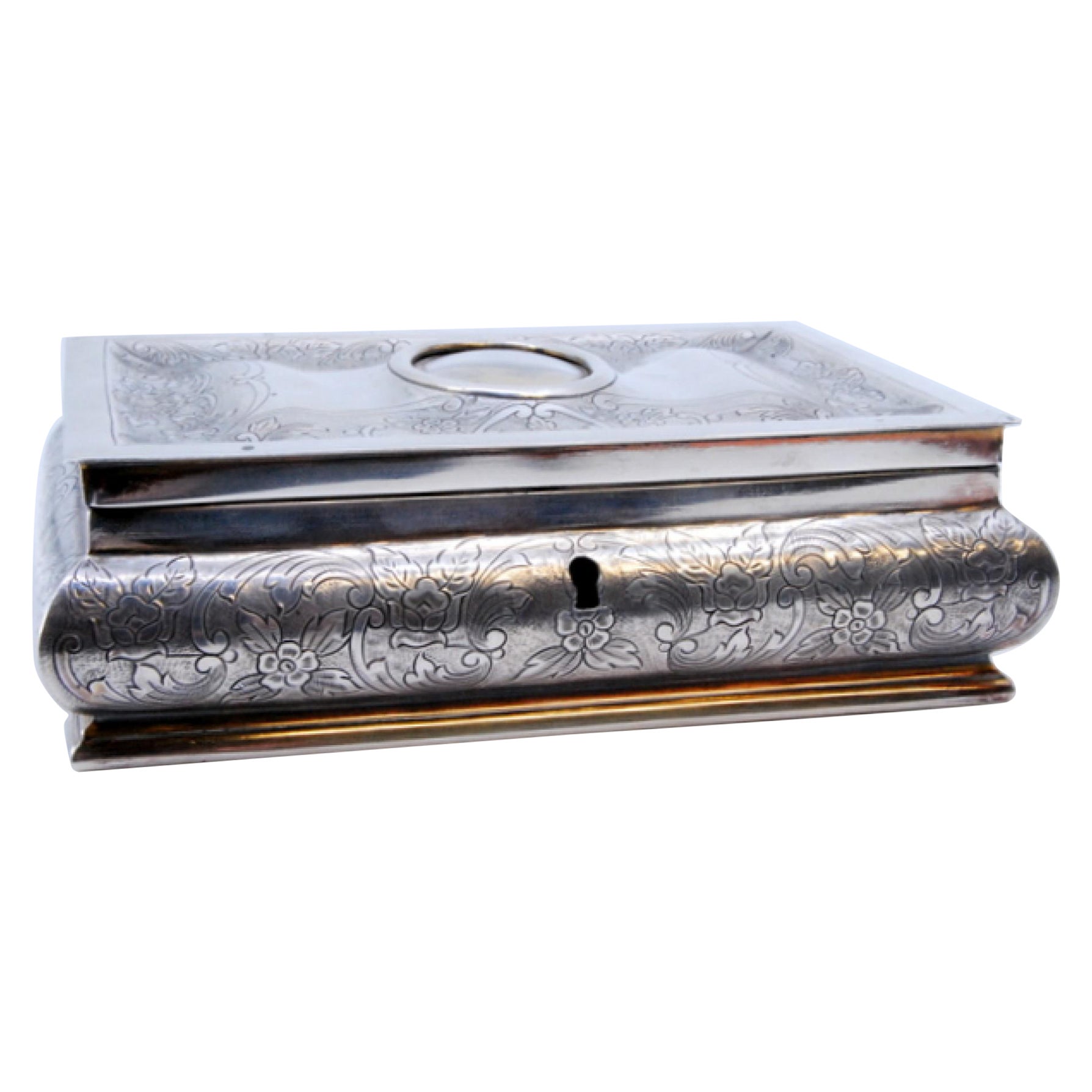 Silver jewelry box with plant engravings and antique-lady card