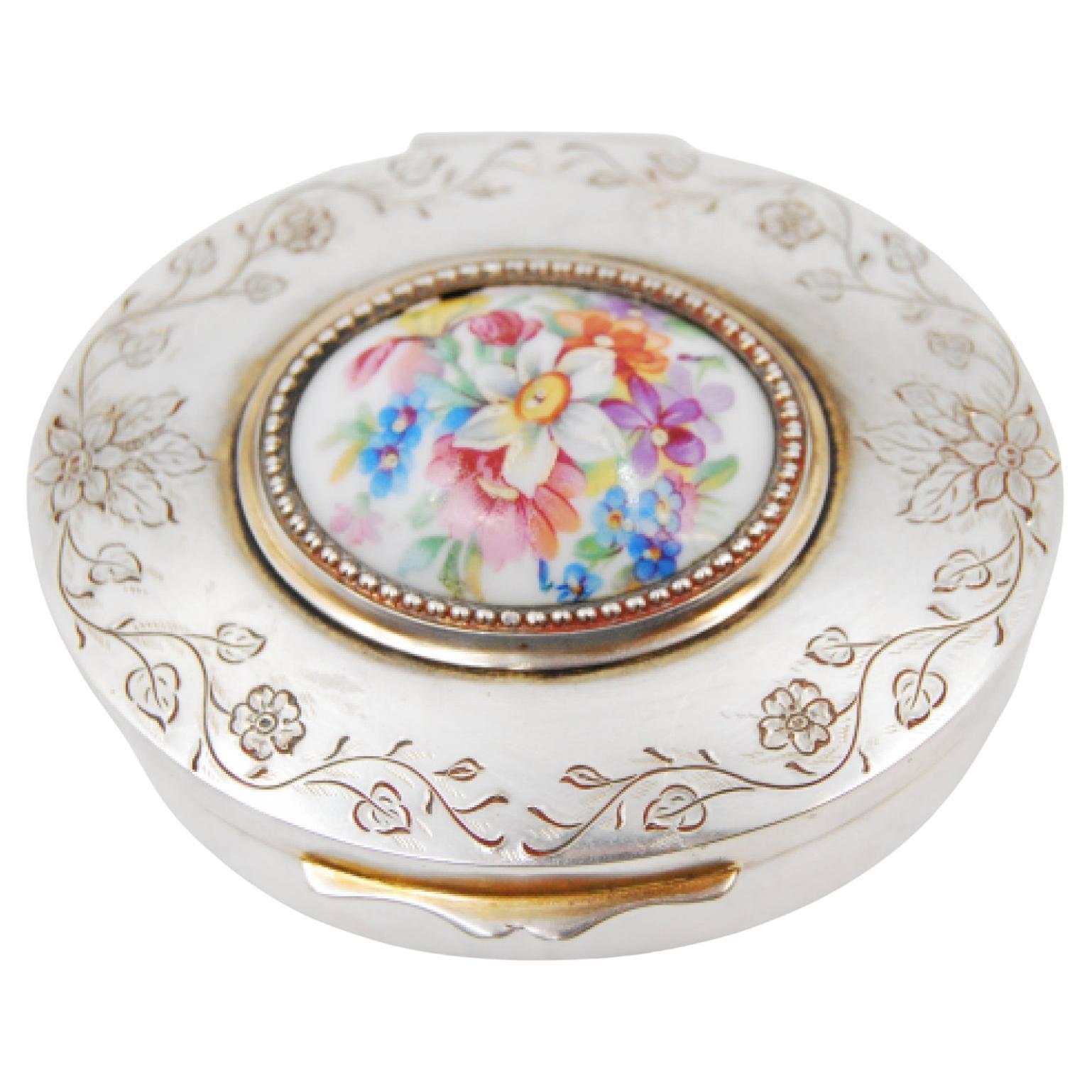 Silver jewelry box with plant engravings and porcelain floral lid For Sale