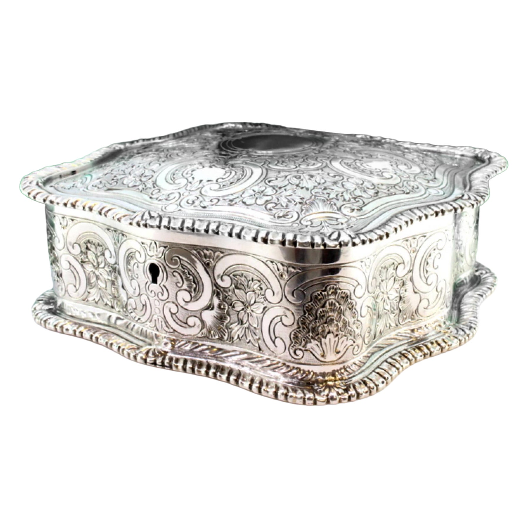 Silver jewelry box with plant engravings, monogram and red velvet interior