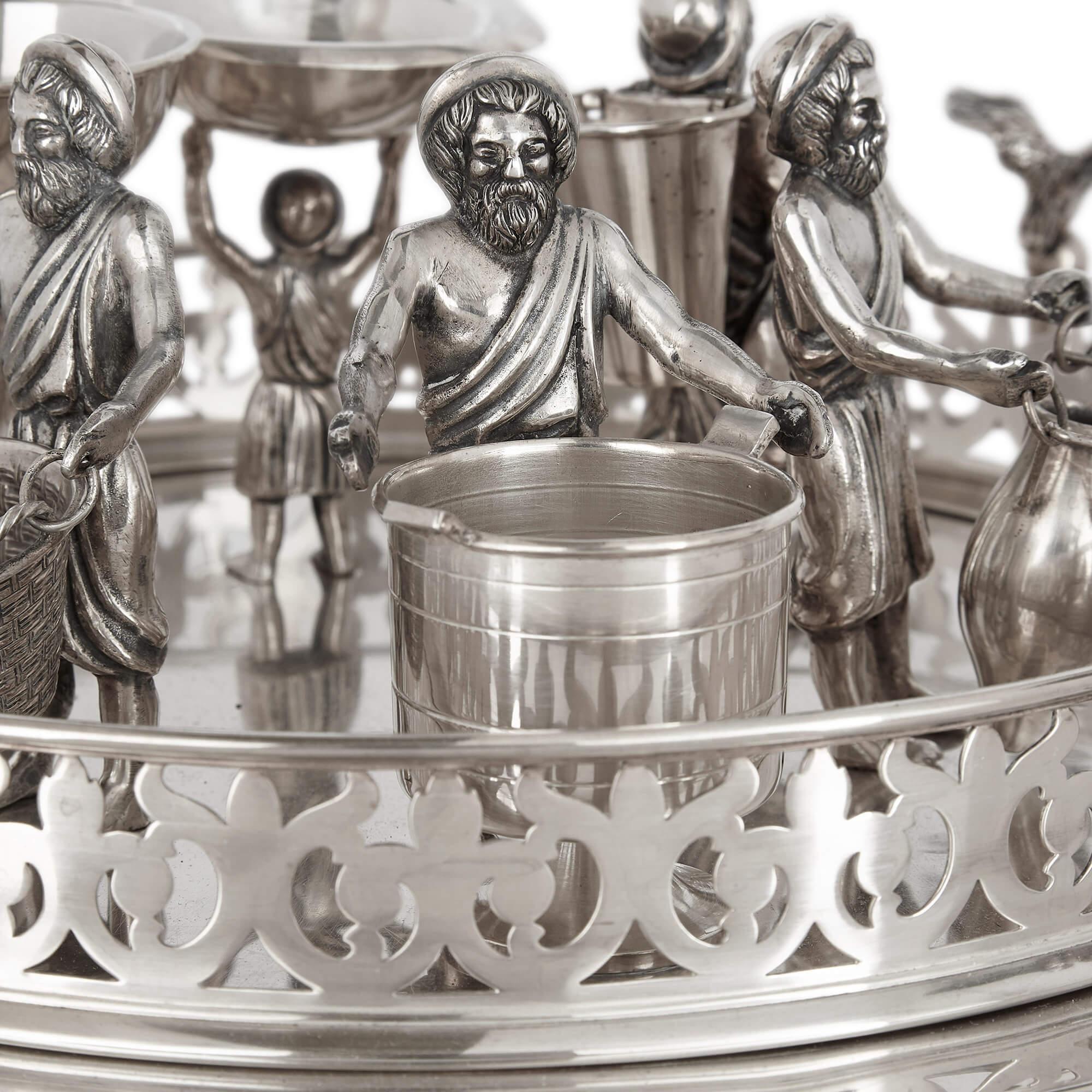 Silver Jewish multi-tiered Passover Seder tray
Continental, Early 20th Century
Height 28cm, diameter 37cm

Made for the Jewish religious festival of Passover, this superb Seder tray is an early twentieth century continental piece with multiple