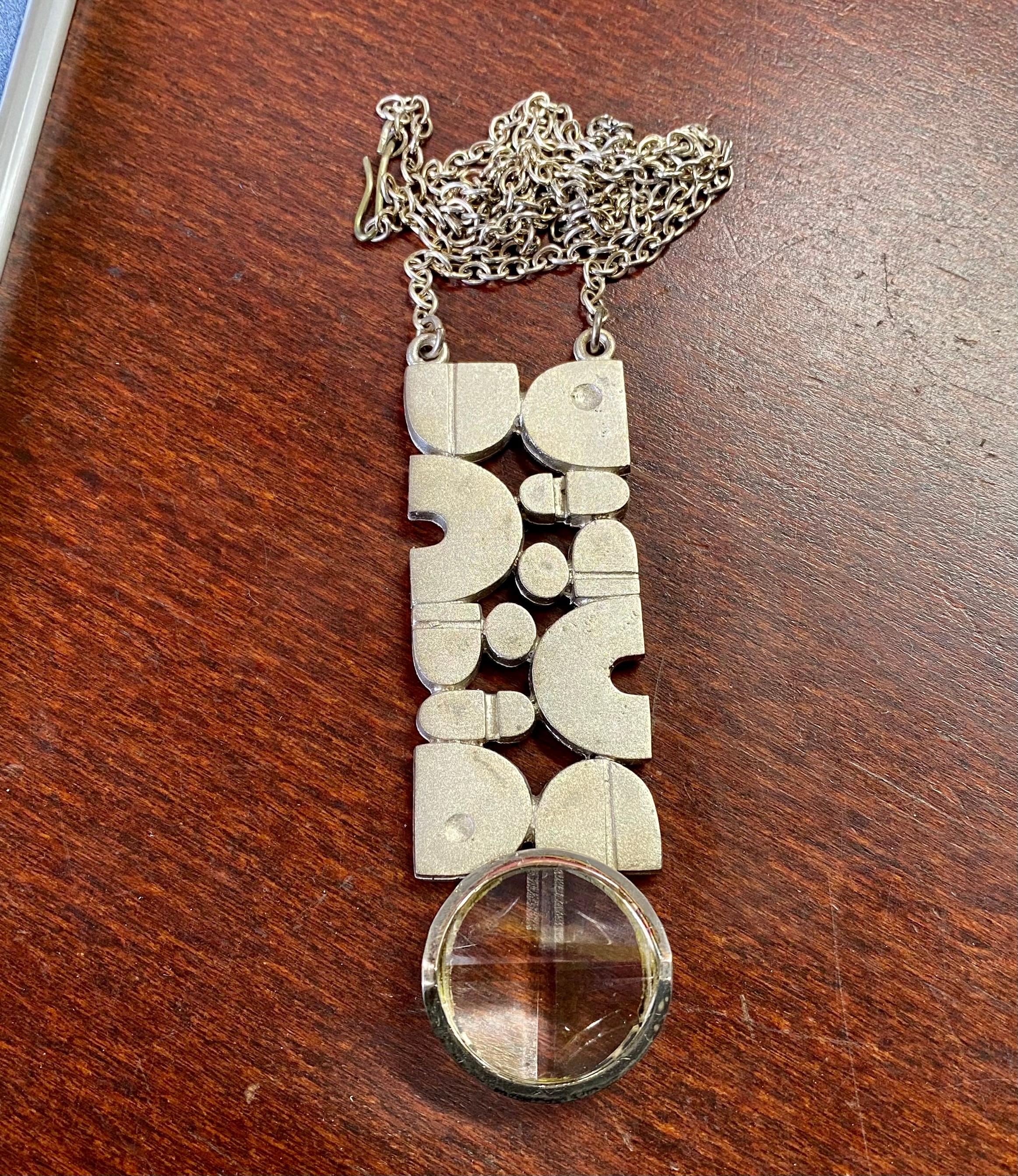 Silver Jorma Laine Turun Hopea 1973 Necklace
With rock crystal
Really big and showy.
New unused Necklace from 1973.
Goldsmith's old warehouse.

I also have a lot of other Jorma Laine Unused jewelry for sale. See one picture with a collection of old,