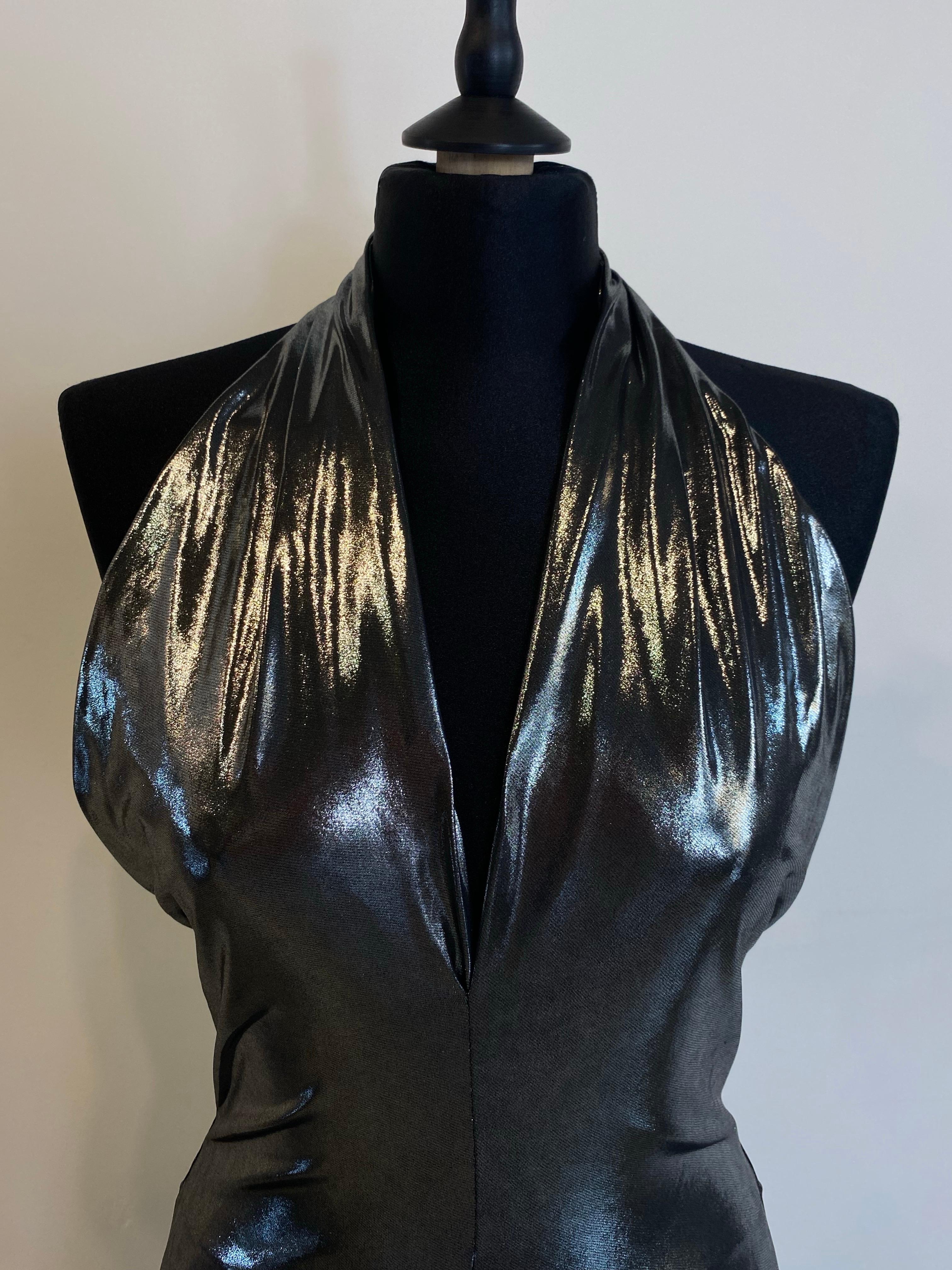Size 42 IT.
100% polyester.
Height 170 cm.
Waist 32 cm.
Leg length 100 cm.
Very elastic jumpsuit can also fit larger sizes.
Never worn with tag still on.