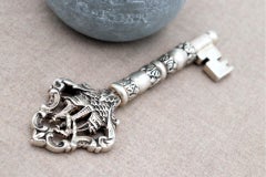 Silver key-shaped corkscrew