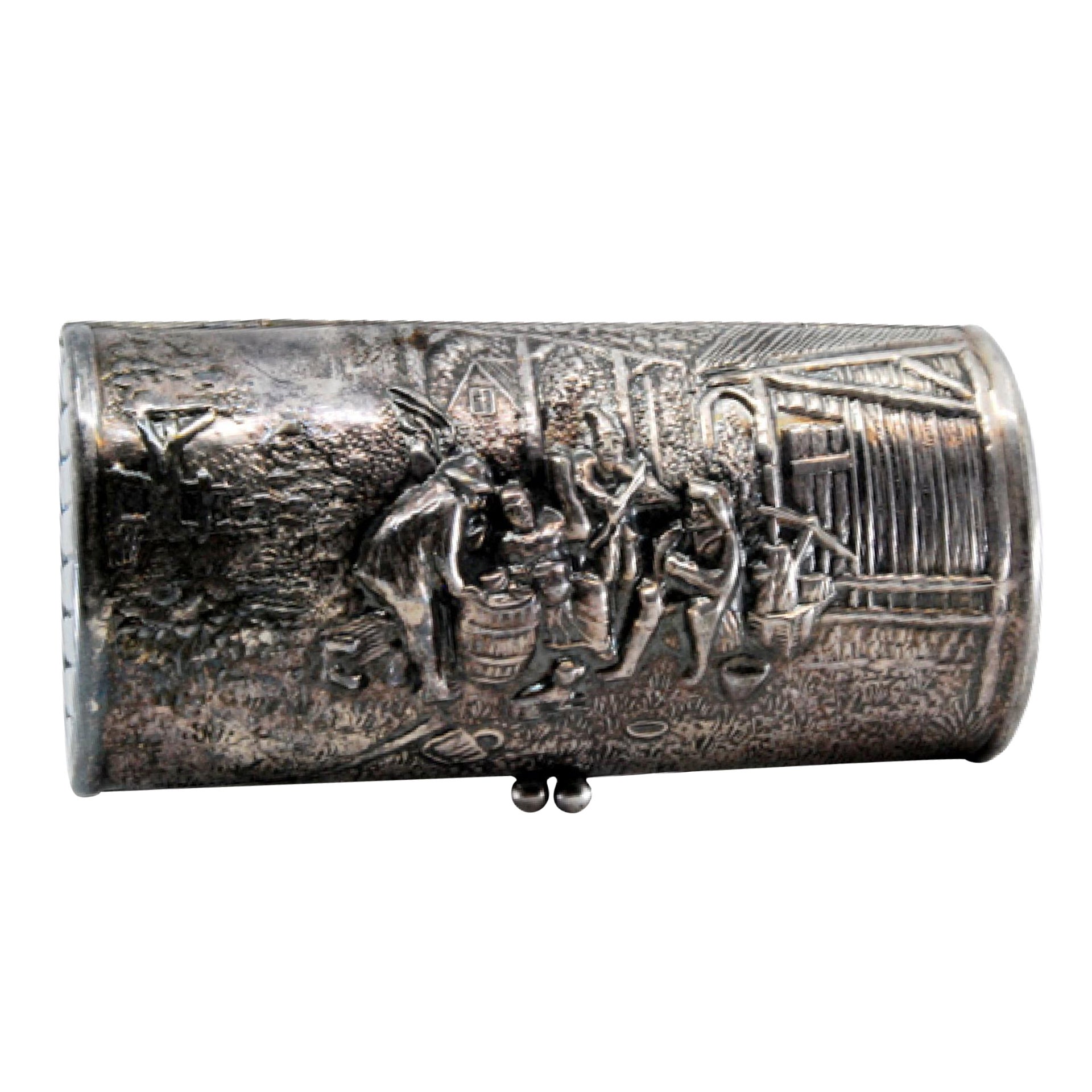 Silver lady
s pin box with reliefs on both sides and a gold interior