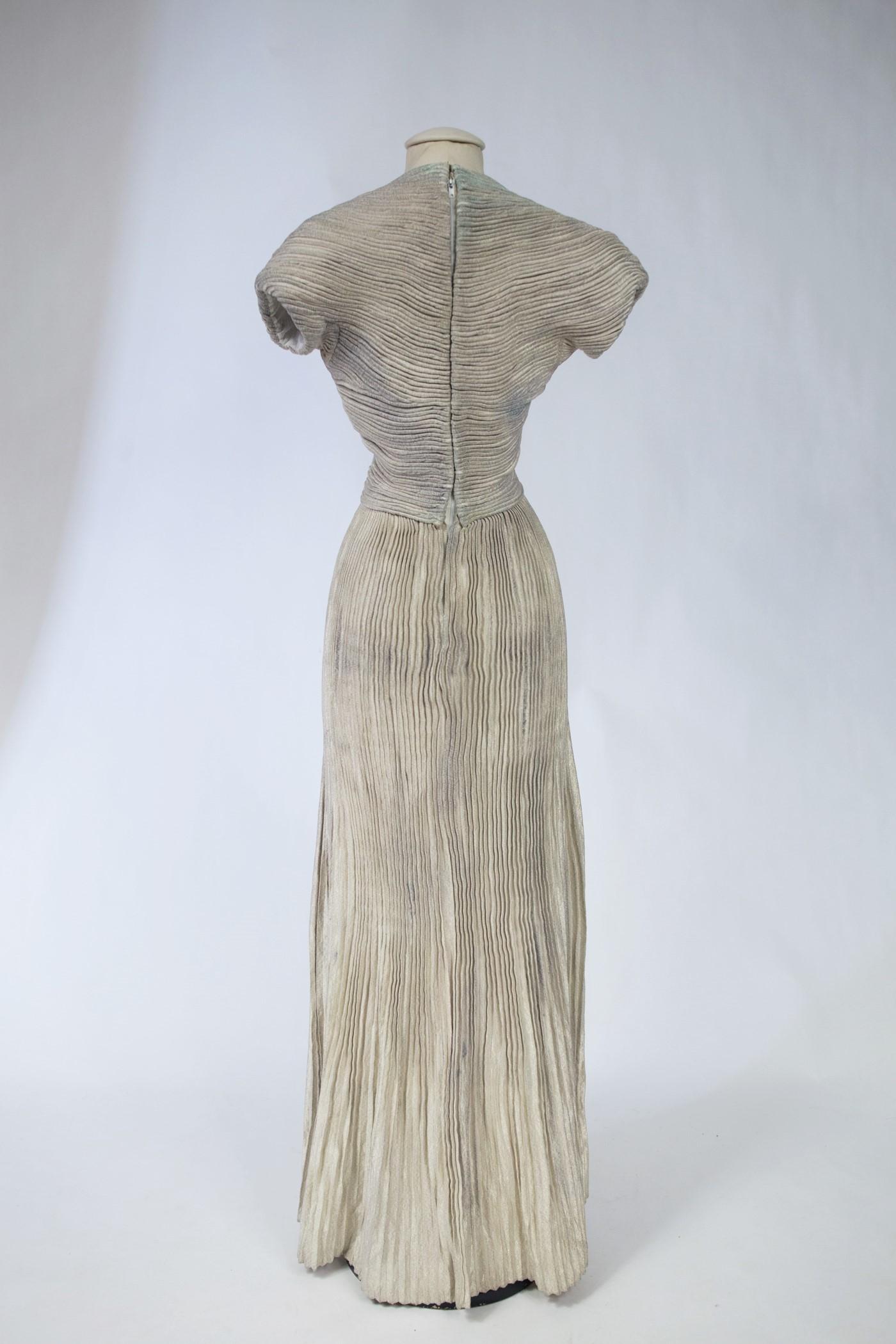A Silver Lamé Evening Dress by Lucile Manguin - France Haute Couture Circa 1940 For Sale 4