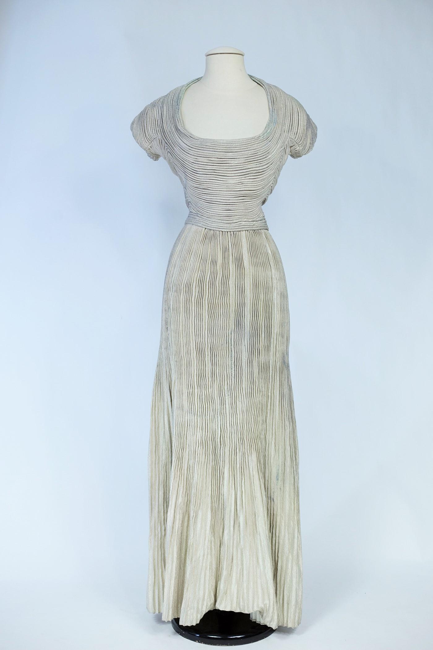 A Silver Lamé Evening Dress by Lucile Manguin - France Haute Couture Circa 1940 For Sale 1
