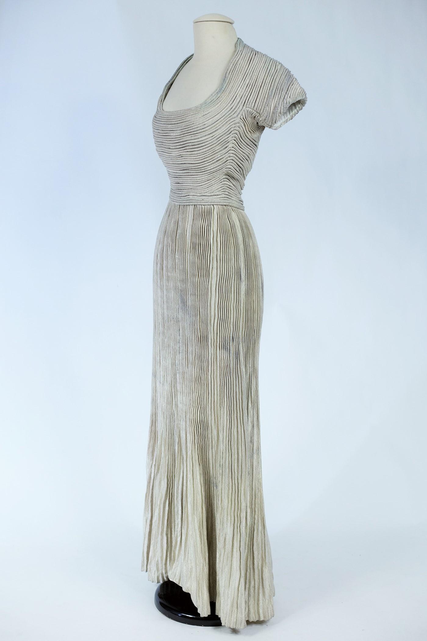 A Silver Lamé Evening Dress by Lucile Manguin - France Haute Couture Circa 1940 For Sale 2