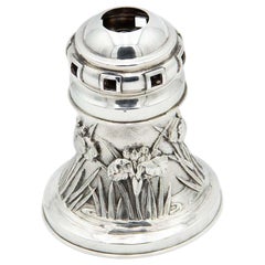 Silver lamp with floral reliefs in the Art Nouveau style