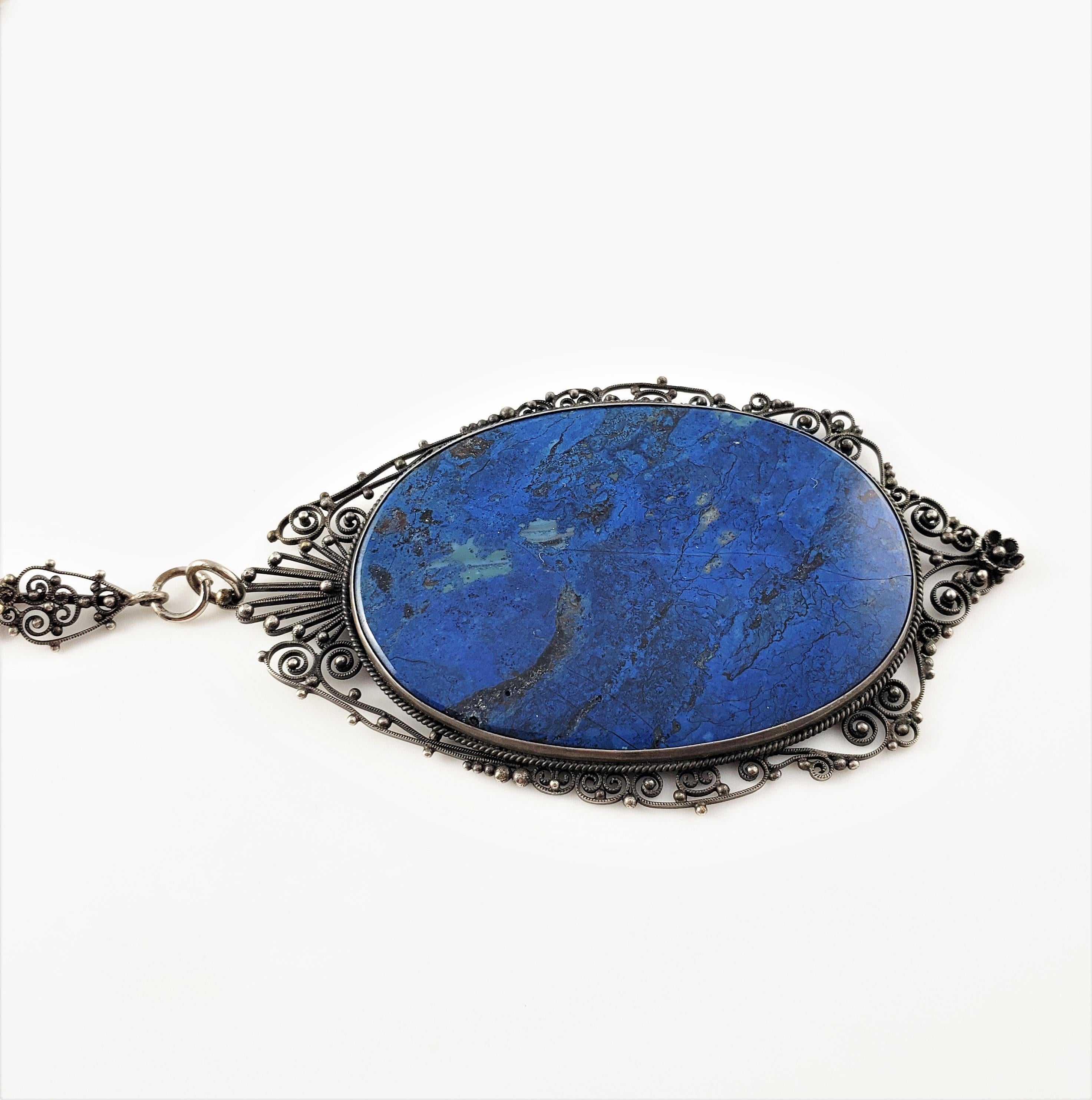Vintage Silver Large Filigree Lapis Pendant Necklace-

This stunning necklace features a lovely oval lapis stone (2.5