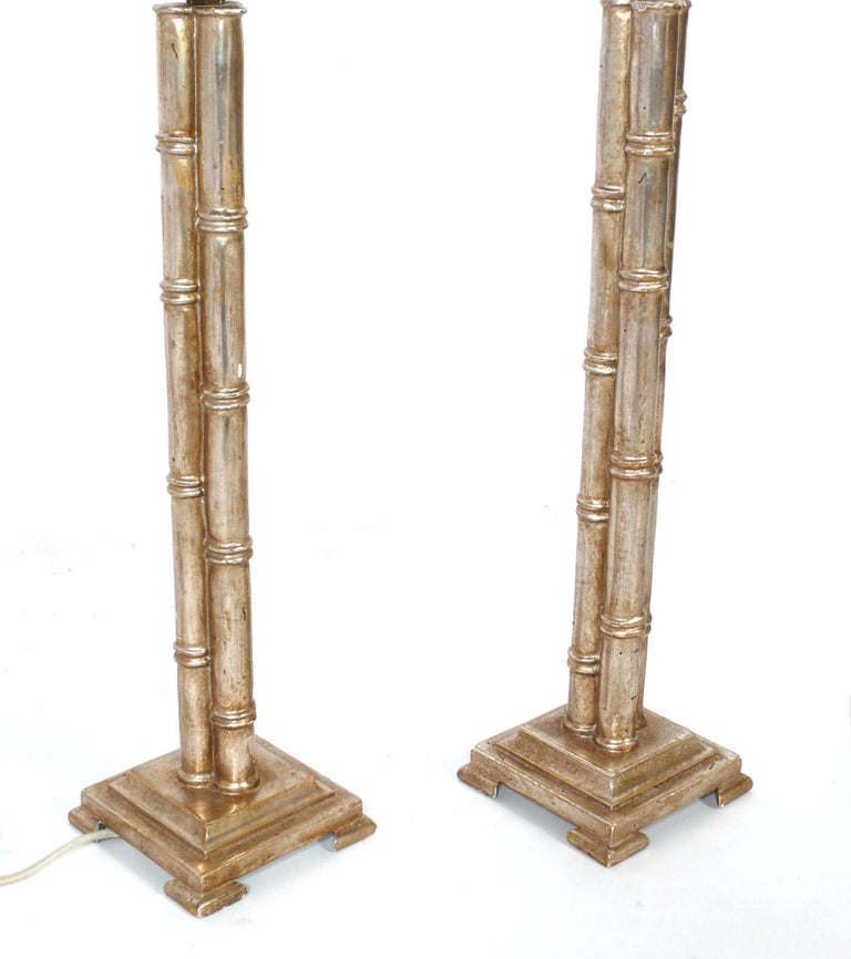 Pair of silver leaf bamboo form table lamps, designed by Nancy Corzine, American, circa 2000s. The price noted includes the shades.