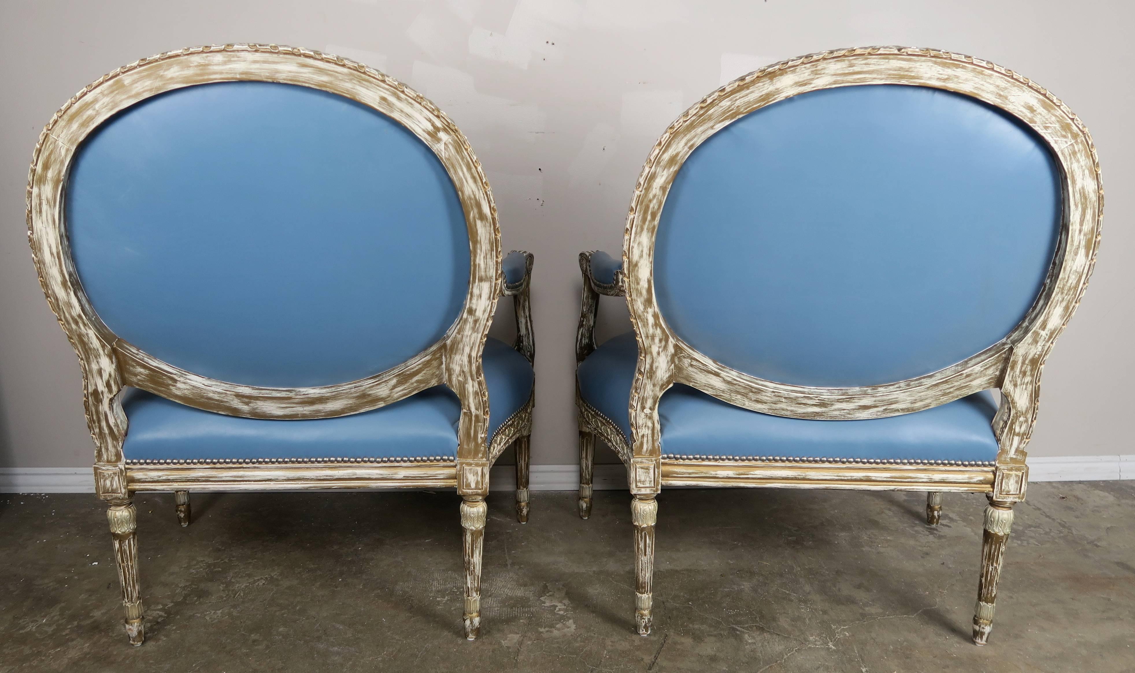 Silver Leaf Neoclassical Style Leather Armchairs, Pair In Distressed Condition In Los Angeles, CA