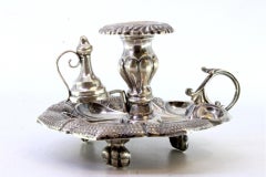 Silver leaf-shaped paddle with applications, flame arrester, and claw feet