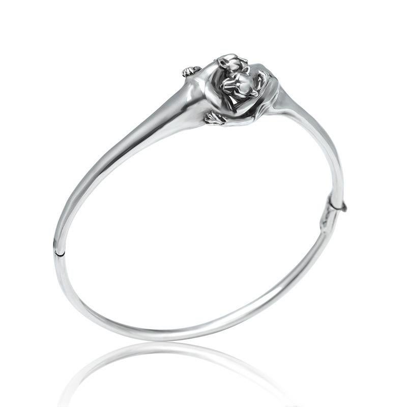 Silver Leopard Rigid Bangle Bracelet with Embracing Leopards en venta