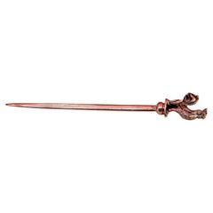 Silver letter opener with a perfectly shaped rooster on the handle.