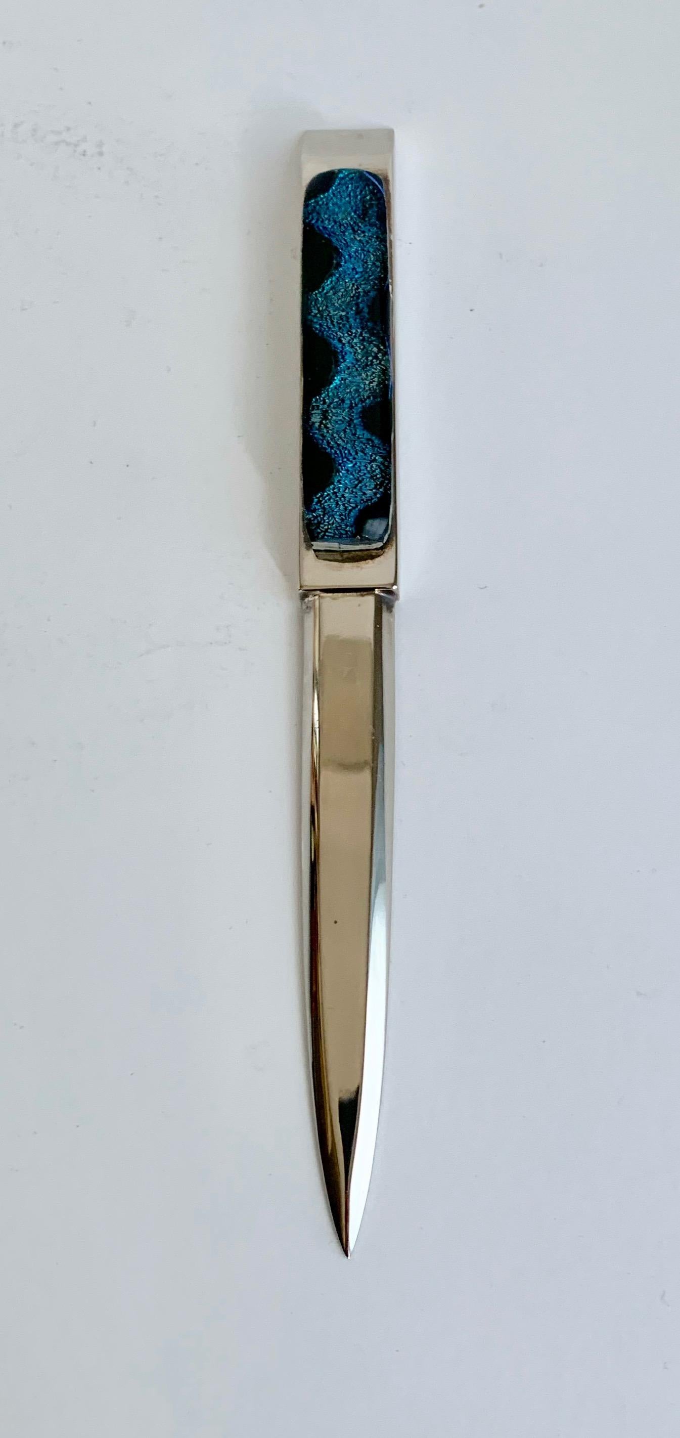 A handsome letter opener with blue glass, simple and wonderful for the desk or room with blue accents... a great gift.