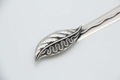 Silver letter opener with embossed leaf-shaped handle