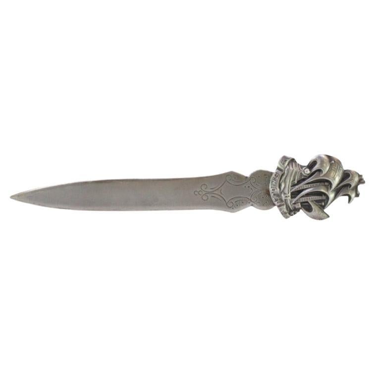 Silver letter opener with high relief of the Caravel St. Michael on the handle For Sale