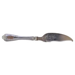 Silver letter opener with reliefs on the handle 
blade with floral engravings