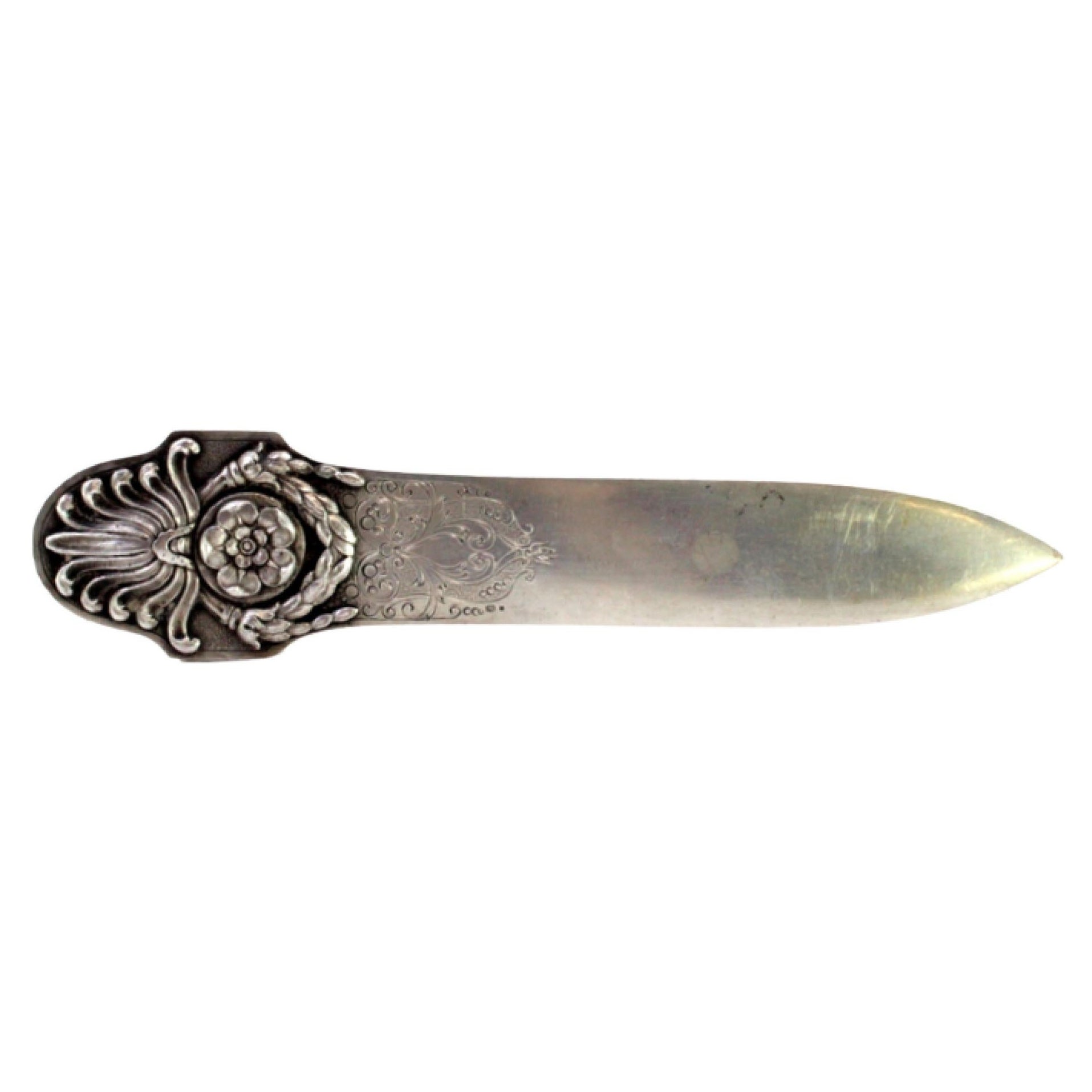 Silver letter opener with wreaths and floral motifs, engraved on the blade