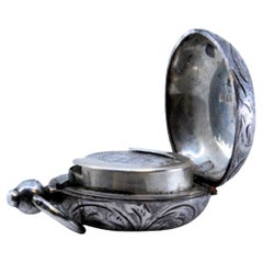 Silver Libra holder with reliefs