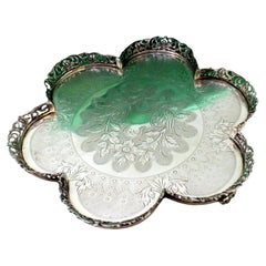 Silver lobed salver with guilloche cut-out grid 
3 openwork feet