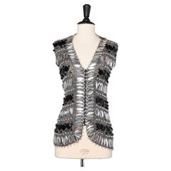 Silver lurex knit vest with oversize black and silver cabochons Loris Azzaro 