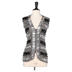 Silver lurex knit vest with oversize black and silver cabochons Loris Azzaro