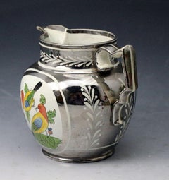Silver Luster Pottery Pitcher with Enamel Colored Panels of Birds on a Thistle